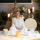 Woman with white dress sitting behind Opal Moon Bowl Set