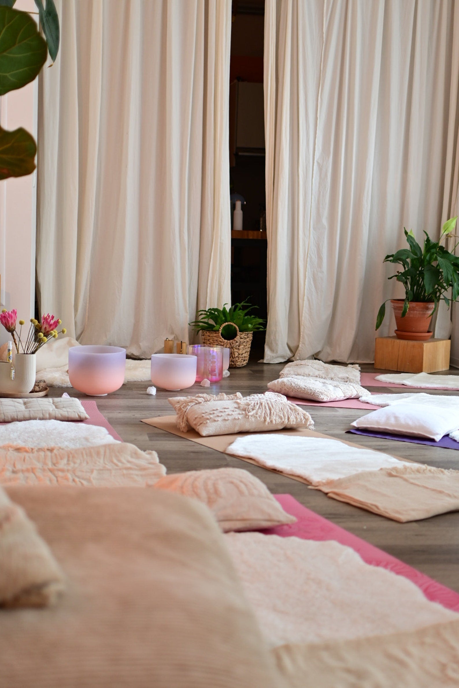 Yoga studio with yoga mats and Cosmic Sound Bowls® 'Driven by the Moon' Frosted Singing Bowls