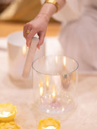 Hand with mallet playing Opal Moon Bowl 